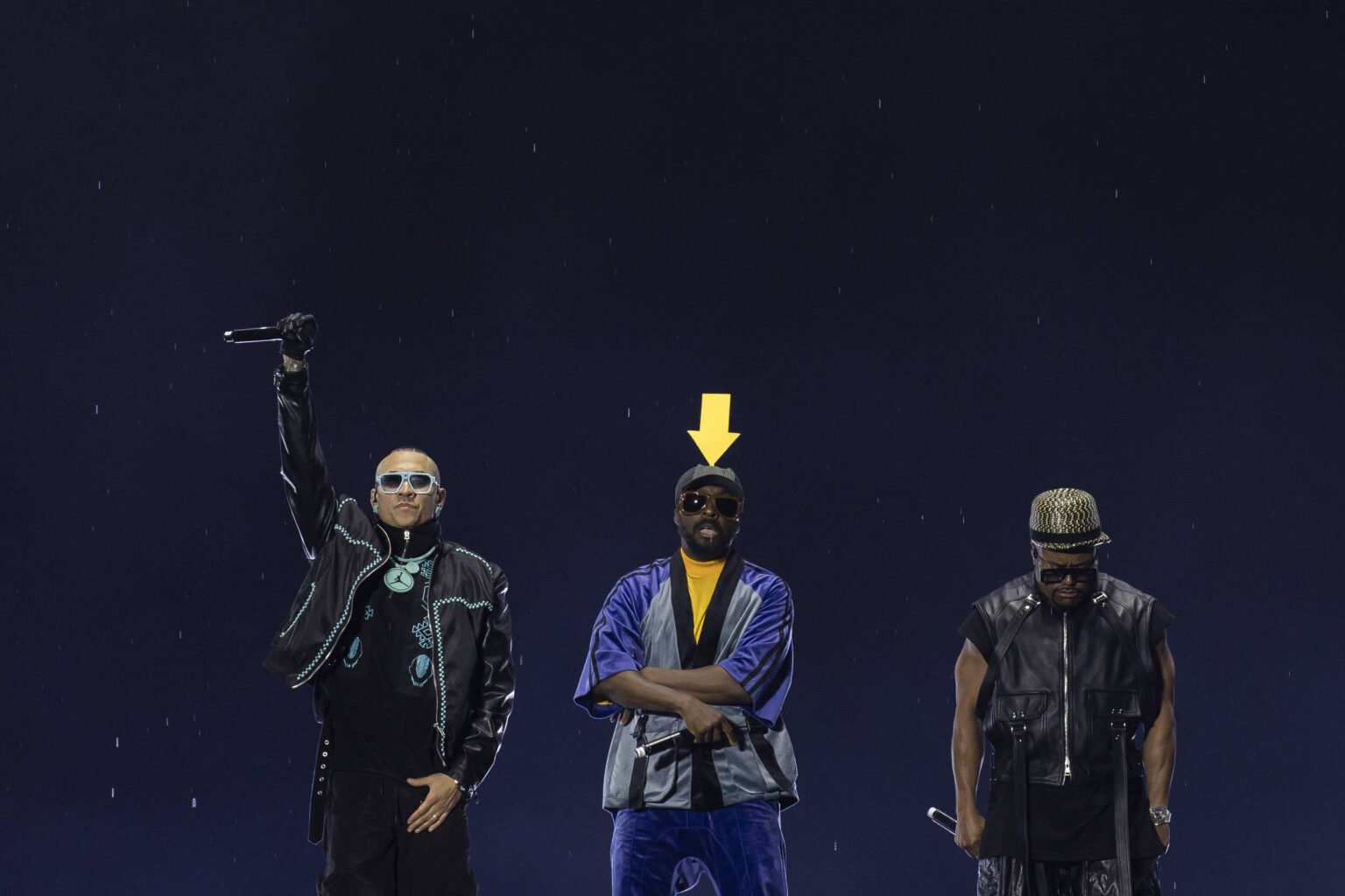 Sob chuva e nostalgia, Black Eyed Peas faz a plateia do Rock in Rio pular do início ao fim