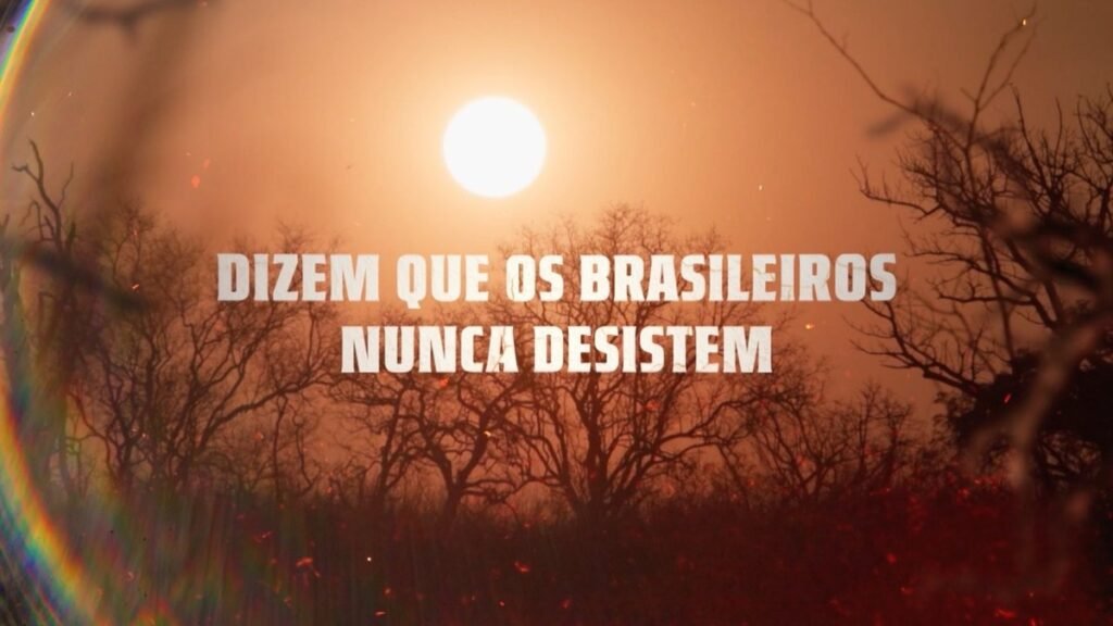 Arte de Largados e Pelados Brasil com savana africana ao pôr do sol e a frase "Dizem que os brasileiros nunca desistem", da 4ª temporada gravada na África do Sul